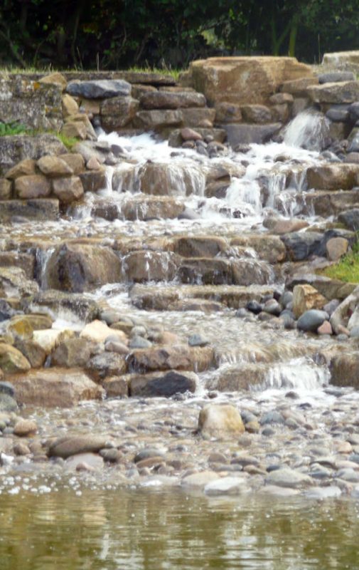 2-large-waterfall-in-a-water-garden-at-a-garden-centre-in-hook-hampshire-design-by-ryan-strong